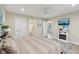 Comfortable main bedroom with neutral decor, ceiling fan, and a view to the fireplace at 3713 W 98Th St, Carmel, IN 46032