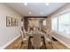 Chic dining area boasting modern decor and plenty of seating for Gathering and guests at 3822 Spann Ave, Indianapolis, IN 46203