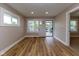 A bright, open room with hardwood flooring, recessed lighting, and plenty of natural light at 3822 Spann Ave, Indianapolis, IN 46203
