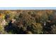 Aerial view of a property surrounded by colorful trees and manicured landscaping at 4000 N Meridian St # Apt 11D, Indianapolis, IN 46208