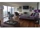 Spacious bedroom features a comfortable bed, stylish decor and large windows with a view at 4000 N Meridian St # Apt 11D, Indianapolis, IN 46208