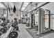 Modern gym featuring weight machines, free weights, treadmills, and mounted TVs at 4000 N Meridian St # Apt 11D, Indianapolis, IN 46208