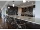 Modern kitchen featuring updated appliances, ample counter space, and an eat-in island at 4000 N Meridian St # Apt 11D, Indianapolis, IN 46208