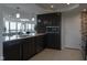 This kitchen features stainless steel appliances, and modern cabinetry and is open to the living space at 4000 N Meridian St # Apt 11D, Indianapolis, IN 46208