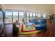 Spacious living area with floor to ceiling windows providing natural light and city views at 4000 N Meridian St # Apt 11D, Indianapolis, IN 46208