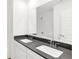 Bathroom features a dual sink vanity with chrome faucets and a large mirror at 4390 Red Pine Dr, Bargersville, IN 46106