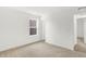 Bedroom showcasing neutral carpeting, white walls, and an access door for convenience at 4390 Red Pine Dr, Bargersville, IN 46106