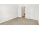 Bedroom with carpet and view into hall at 4390 Red Pine Dr, Bargersville, IN 46106