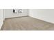 Large bedroom with plush carpeting and a bright window offering neighborhood views at 4390 Red Pine Dr, Bargersville, IN 46106