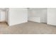 Upstairs living area with neutral carpet and white walls at 4390 Red Pine Dr, Bargersville, IN 46106