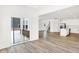 Expansive living space open to the kitchen, complemented by modern sliding glass doors at 4390 Red Pine Dr, Bargersville, IN 46106