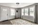 Inviting room featuring hardwood floors, neutral walls and bright natural light at 4926 Crittenden Ave, Indianapolis, IN 46205