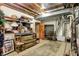 Storage space in basement with some open storage shelving and vintage furniture at 5268 Woodfield Dr N, Carmel, IN 46033