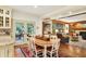 Bright kitchen with island seating and easy access to outdoor patio at 5268 Woodfield Dr N, Carmel, IN 46033