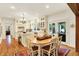 Charming eat-in kitchen with white cabinets and stainless steel appliances at 5268 Woodfield Dr N, Carmel, IN 46033