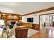 Cozy living room featuring hardwood floors and open layout to other rooms at 5268 Woodfield Dr N, Carmel, IN 46033
