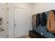 Charming mudroom with convenient coat hooks, storage bench, and access to nearby rooms at 527 Macintosh Ln, Danville, IN 46122
