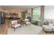 Spacious open floor plan with an elegant living area flowing into a dining space and kitchen for seamless entertaining at 527 Macintosh Ln, Danville, IN 46122