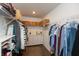 Organized walk-in closet featuring shelving, hanging rods, and a dresser for ample storage space at 527 Macintosh Ln, Danville, IN 46122
