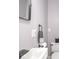 Contemporary bathroom with modern fixtures, sleek lines, and neutral tones for a relaxing experience at 5342 Central Ave, Indianapolis, IN 46220