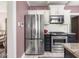 Modern kitchen featuring stainless steel appliances and granite countertops for a sleek and functional space at 5342 Central Ave, Indianapolis, IN 46220