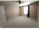 Bright bedroom with a ceiling fan and a window, freshly painted and carpeted at 5379 Marigold Dr, Plainfield, IN 46168