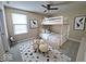 Cozy bedroom featuring a bunk bed, window and contemporary decorations at 5379 Marigold Dr, Plainfield, IN 46168