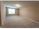 Spacious bedroom with neutral carpet, one window letting in plenty of natural light at 5379 Marigold Dr, Plainfield, IN 46168