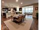Open concept dining area seamlessly connects the kitchen and living room creating an inviting atmosphere at 5379 Marigold Dr, Plainfield, IN 46168