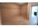 Empty walk-in closet space with wire shelving installed and carpeted floors at 5379 Marigold Dr, Plainfield, IN 46168