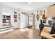 Bright and open home office/bedroom features natural light, hardwood floors, and closet at 5506 Kessler Blvd N Dr, Indianapolis, IN 46228