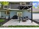 Back patio features outdoor furniture and a grill at 5506 Kessler Blvd N Dr, Indianapolis, IN 46228