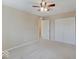 Comfortable bedroom with carpet, ceiling fan, closet, and access to another room at 5768 Blue Sky Dr, Whitestown, IN 46075