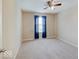 Neutral bedroom featuring plush carpeting, ceiling fan, and natural light from the window at 5768 Blue Sky Dr, Whitestown, IN 46075
