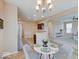 Inviting dining area open to the kitchen and living room, ideal for entertaining at 5768 Blue Sky Dr, Whitestown, IN 46075