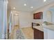 Kitchen featuring stainless steel appliances, granite countertops, and tile flooring at 5768 Blue Sky Dr, Whitestown, IN 46075