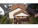Charming single-Gathering home featuring a cozy front porch with inviting orange accents and a well-maintained lawn at 60 S 8Th Ave, Beech Grove, IN 46107