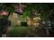 Exterior view of a multilevel home with a backyard, deck, and fence at 6363 Harmonridge Ct, Indianapolis, IN 46278