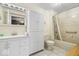 Bathroom with a shower/tub combo and a large vanity at 6363 Harmonridge Ct, Indianapolis, IN 46278