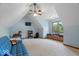 Spacious bedroom with vaulted ceilings, window seat, and natural light at 6363 Harmonridge Ct, Indianapolis, IN 46278