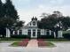 Welcoming community clubhouse with manicured landscaping and inviting entrance at 6363 Harmonridge Ct, Indianapolis, IN 46278