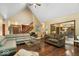 Spacious living room with open layout, hardwood floors, and seamless flow to kitchen at 6363 Harmonridge Ct, Indianapolis, IN 46278