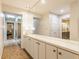 Bright hallway with a large mirror cabinet and views into connecting rooms at 6455 N Olney St, Indianapolis, IN 46220