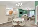 Open floor plan showing dining area leading to the living room with fireplace at 6518 Jade Stream Ct # 312, Indianapolis, IN 46237