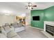 Open concept living room flows to the kitchen and dining area at 6518 Jade Stream Ct # 312, Indianapolis, IN 46237