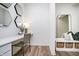 Well-lit office nook with storage and a stylish chair at 6841 Seabiscuit Rd, Whitestown, IN 46075