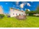 Spacious backyard with a wooden deck perfect for entertaining guests and relaxation at 705 Treyburn Lakes Way, Indianapolis, IN 46239