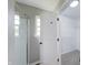 Bathroom featuring glass shower, window, and walk in closet at 705 Treyburn Lakes Way, Indianapolis, IN 46239