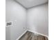Utility room featuring clean walls and durable flooring, ready for appliances and storage at 705 Treyburn Lakes Way, Indianapolis, IN 46239