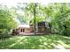 Spacious backyard with a brick patio and lush lawn, perfect for outdoor gatherings and recreation at 7115 Fremont Ct, Indianapolis, IN 46256